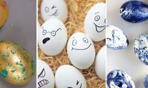 Złote i niebieskie pisanki z papieru, niektóre z namalowanymi buźkami.