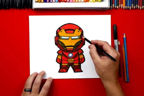 Kolorowy iron man rysunek dla dzieci. Rysunek powstaje przy użyciu kredek i ołówków.