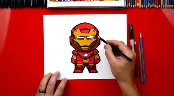 Kolorowy iron man rysunek dla dzieci. Rysunek powstaje przy użyciu kredek i ołówków.