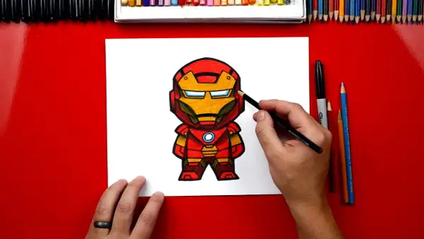 Kolorowy iron man rysunek dla dzieci. Rysunek powstaje przy użyciu kredek i ołówków.